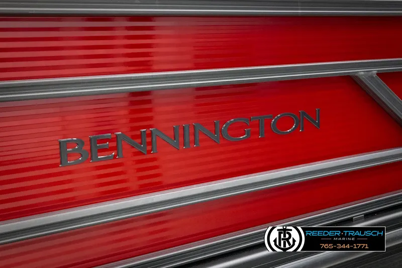 Slide: The Image of 2025 Bennington 22 SSRSE boat with red paneling and Reeder-Trausch Marine logo. - 43