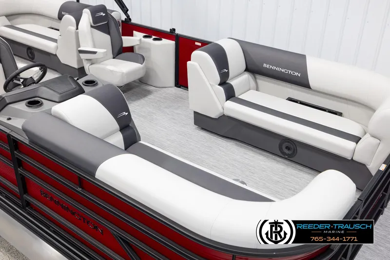 Slide: The Image of 2025 Bennington 22 SSRSE pontoon boat interior with gray and white seating, red exterior accents. - 9