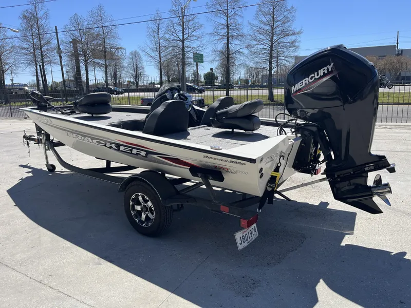 Slide: The Image of 2021 Tracker Pro Team 175 TXW Tournament Edition boat with Mercury engine on trailer. - 10