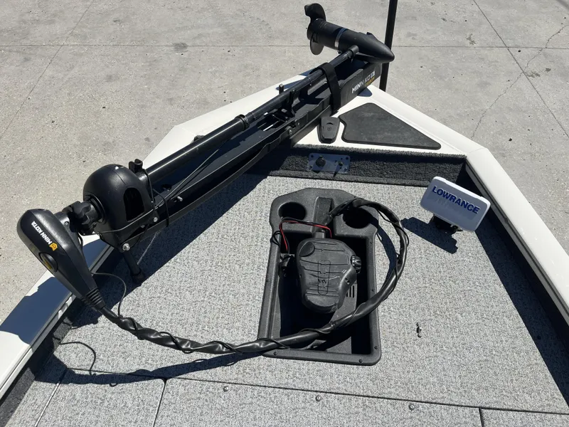 Slide: The Image of 2021 Tracker Pro Team 175 TXW Tournament Edition boat with Minn Kota trolling motor and Lowrance electronics. - 13