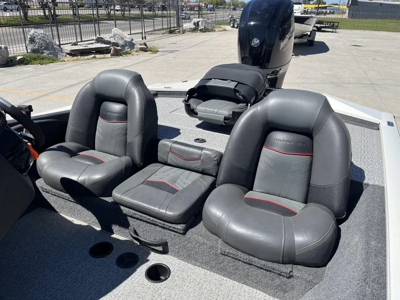 Slide: The Image of 2021 Tracker Pro Team 175 TXW Tournament Edition boat with gray seating and Mercury outboard motor. - 4
