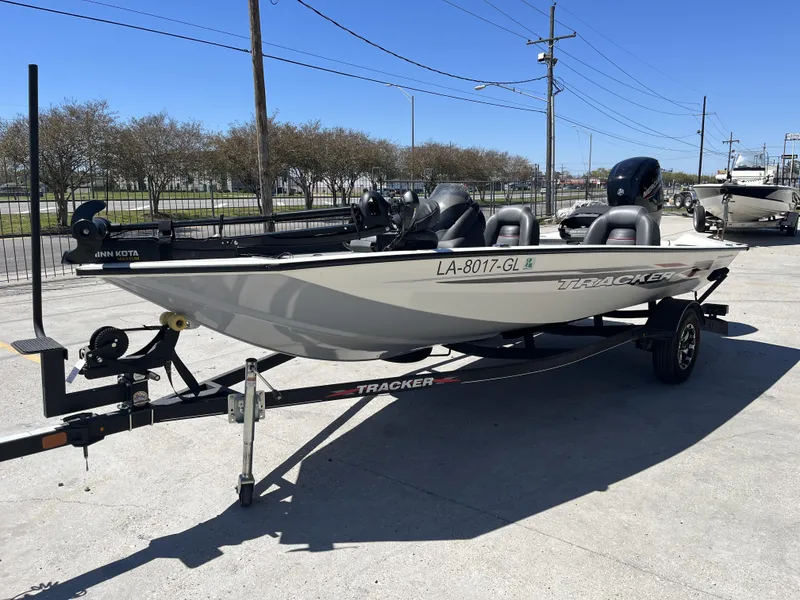 Slide: The Image of 2021 Tracker Pro Team 175 TXW Tournament Edition boat on trailer, parked outdoors. - 9