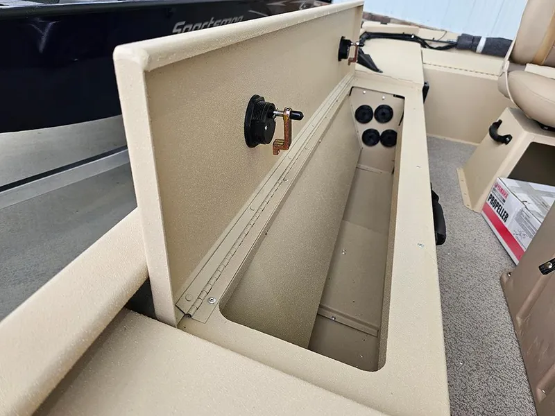 Slide: The Image of 2025 G3 Sportsman 1610 SS boat storage compartment with lock and power outlets. - 18