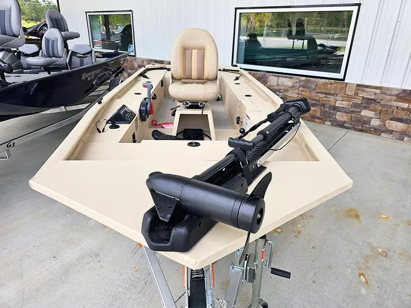 Slide: The Image of 2025 G3 Sportsman 1610 SS fishing boat with beige interior and mounted equipment. - 4