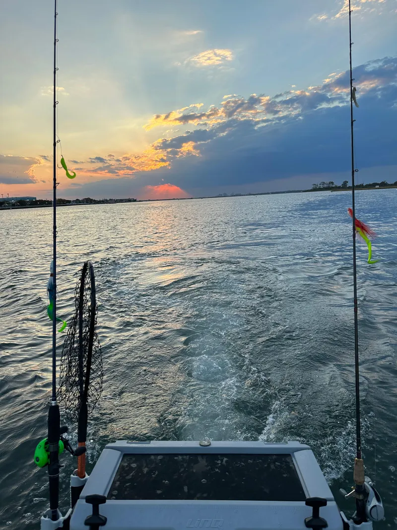 Slide: The Image of 2019 Sea-Doo GTR 230 on water at sunset with fishing gear. - 12
