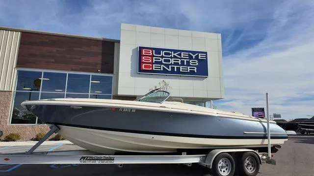 Slide: The Image of 2017 Chris-Craft Launch 27 boat on trailer at Buckeye Sports Center. - 2