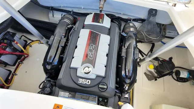 Slide: The Image of 2017 Chris-Craft Launch 27 engine compartment with 6.2L 350 horsepower engine. - 33