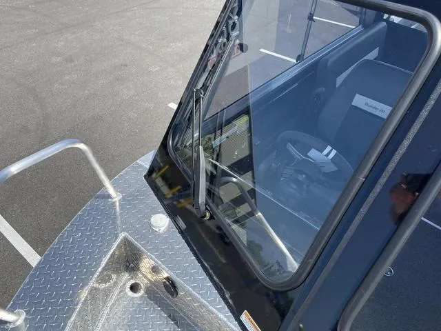 Slide: The Image of 2024 Thunder Jet Alexis OS 22' boat windshield and deck detail. - 44