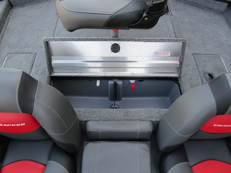 Slide: The Image of 2025 Tracker Pro Team 175 TXW boat interior with storage compartment and seating. - 8