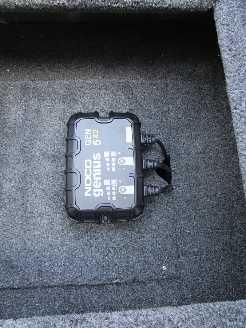 Slide: The Image of NOCO Genius GEN5X2 charger in Tracker Pro Team 175 TXW, 2025 model. - 9