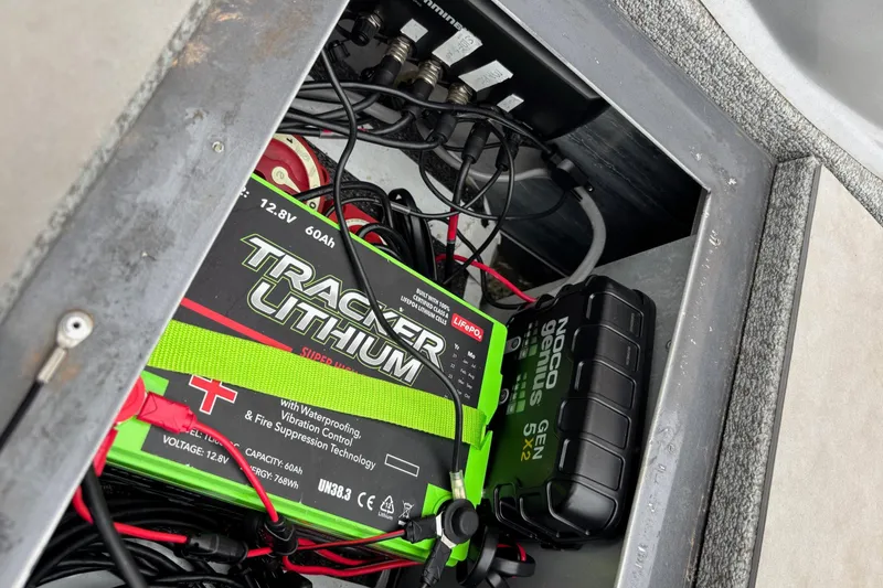 Slide: The Image of Battery compartment of 2020 G3 Sportsman 1610 with Tracker Lithium battery and wiring. - 10