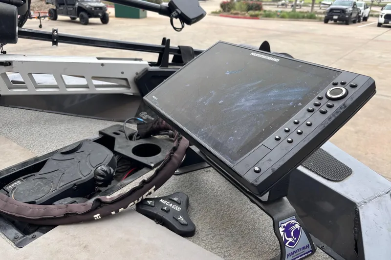 Slide: The Image of 2020 G3 Sportsman 1610 boat dashboard with advanced navigation system. - 4