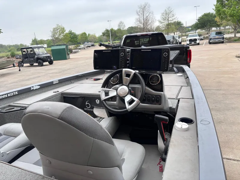 Slide: The Image of 2020 G3 Sportsman 1610 boat interior with steering wheel and control panel. - 5