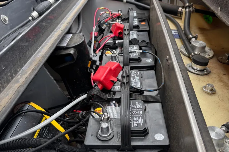 Slide: The Image of Battery compartment of 2020 G3 Sportsman 1610 boat, showing multiple connected batteries. - 9