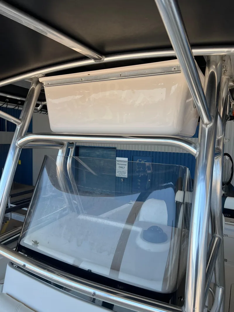 Slide: The Image of Century 2600 CC 2007 boat with stainless steel frame and storage compartment. - 16