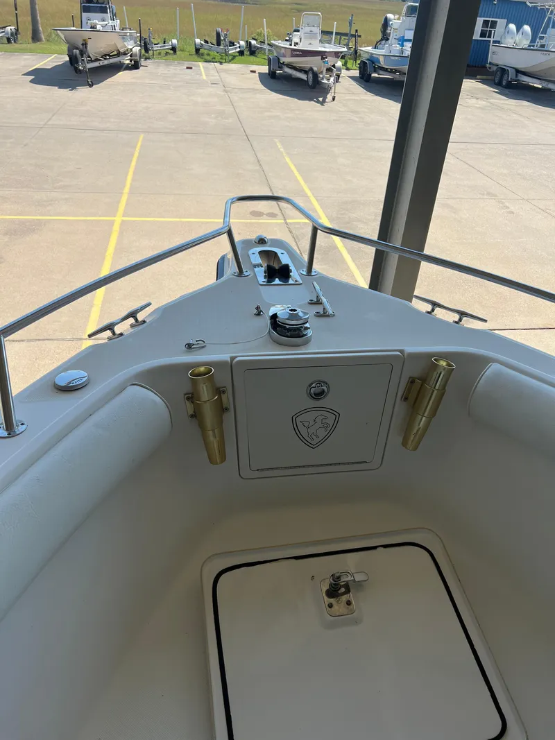 Slide: The Image of 2007 Century 2600 CC boat bow view at a marina. - 19