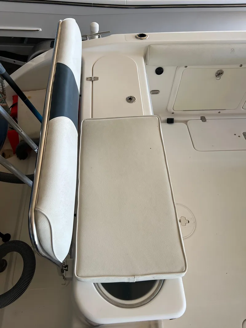 Slide: The Image of Century 2600 CC 2007 boat interior with cushioned seating and storage compartments. - 26