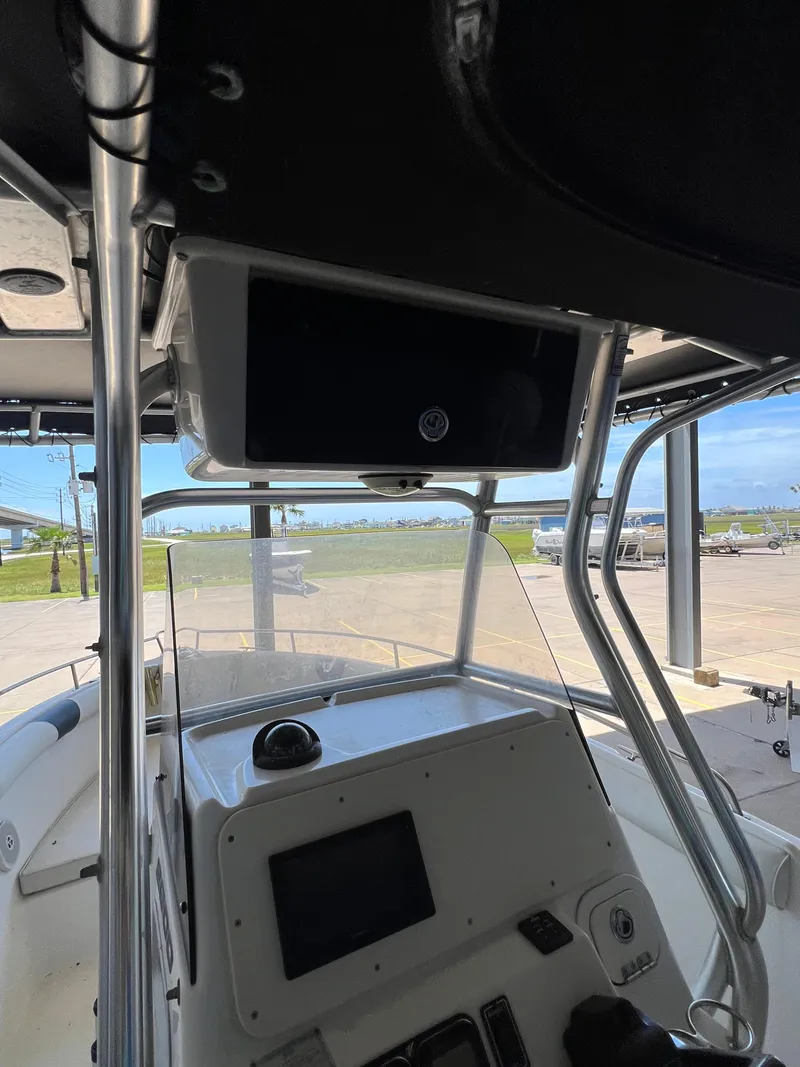 Slide: The Image of 2007 Century 2600 CC boat interior with console and navigation equipment. - 37