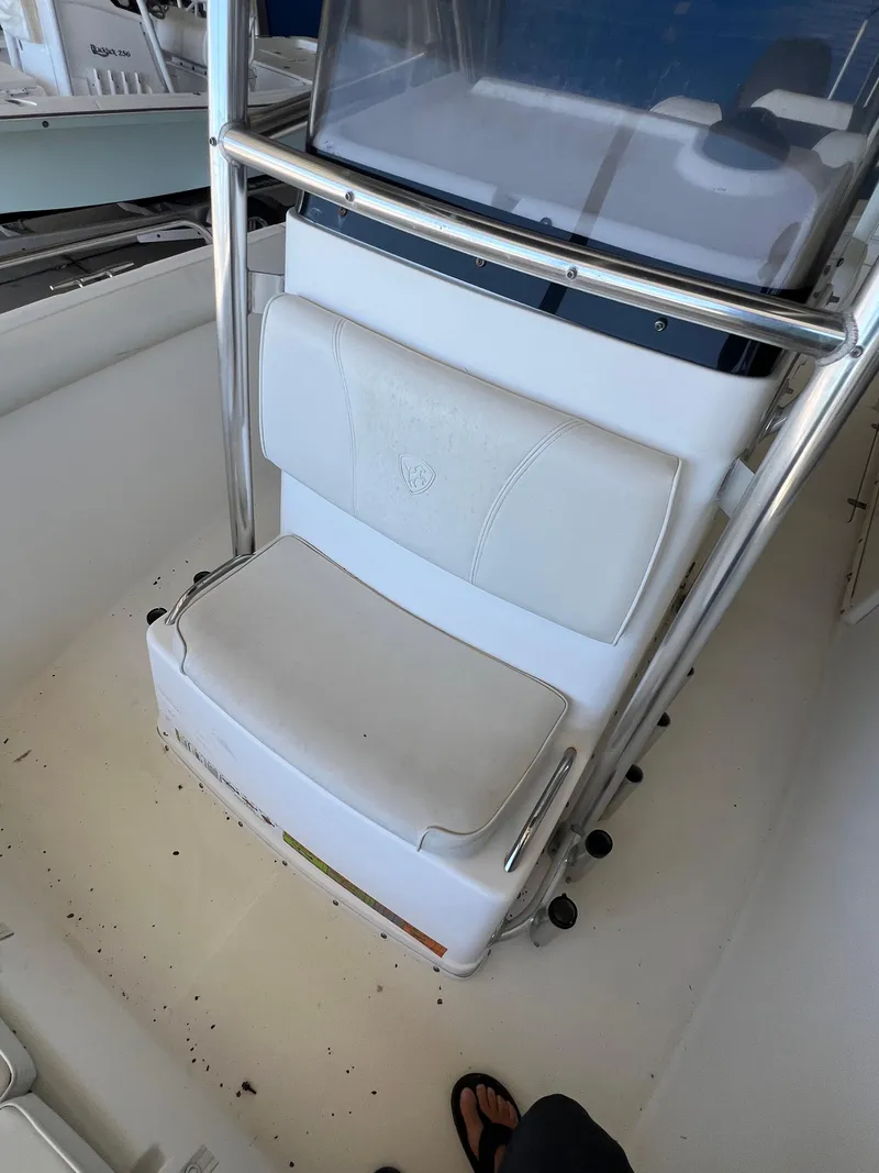 Slide: The Image of White seating on 2007 Century 2600 CC boat, featuring stainless steel frame. - 38