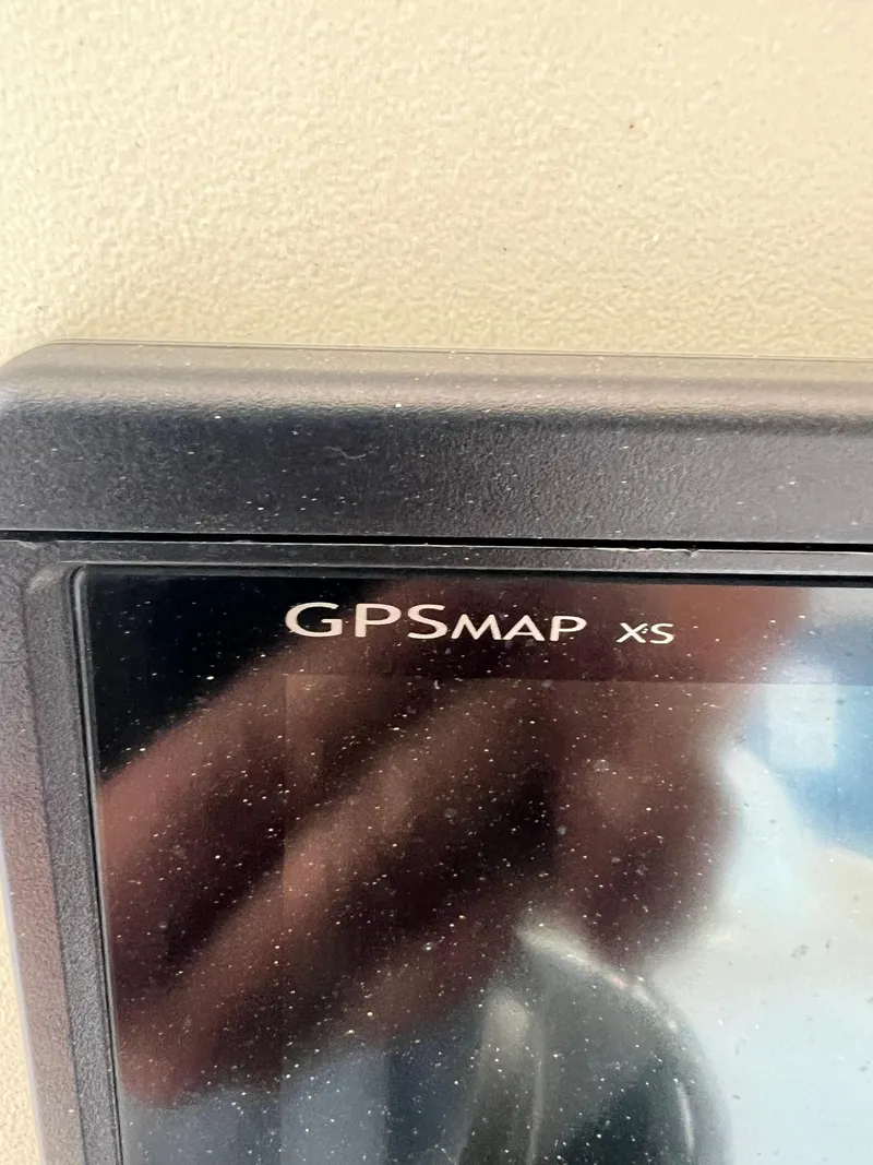 Slide: The Image of Close-up of a GPSmap XS device screen on a 2007 Century 2600 CC boat. - 4
