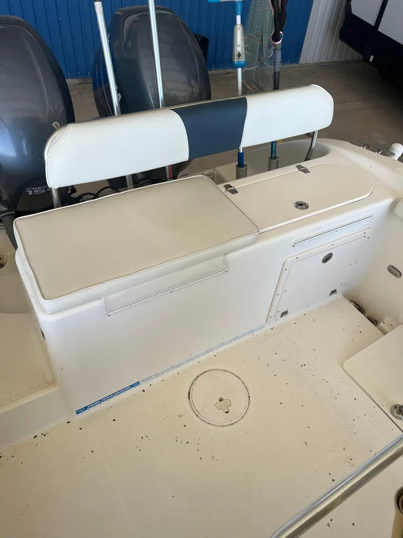 Slide: The Image of 2007 Century 2600 CC boat interior with seating and storage compartments. - 45