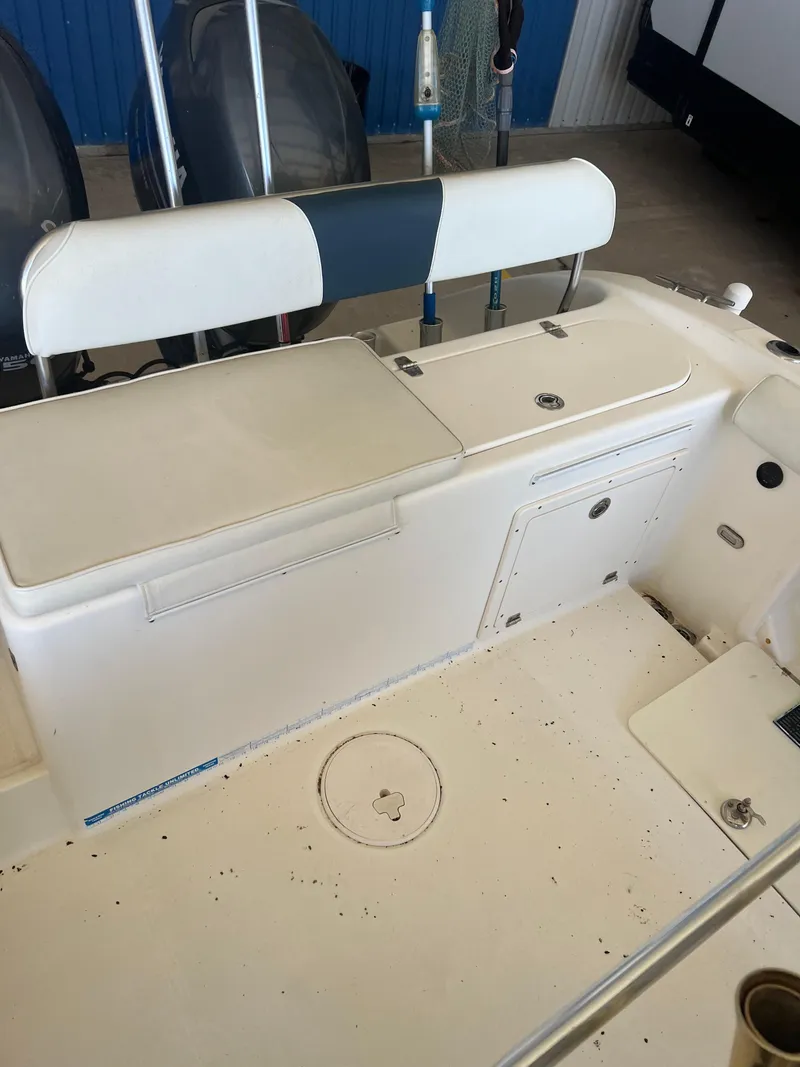 Slide: The Image of 2007 Century 2600 CC boat interior with seating and storage compartments. - 46