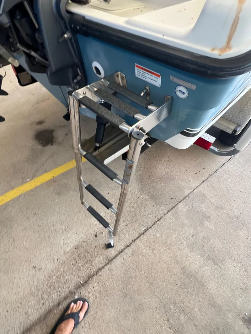 Slide: The Image of Stainless steel boat ladder on a 2007 Century 2600 CC. - 48