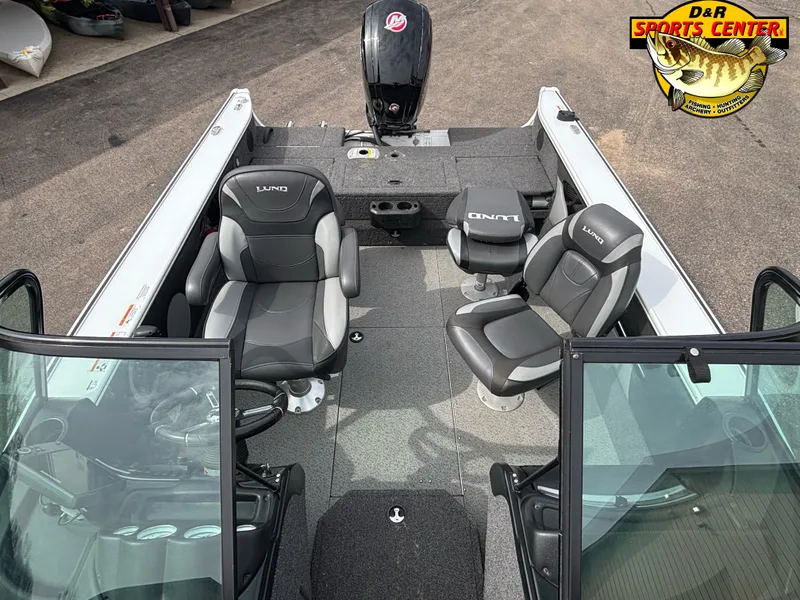 Slide: The Image of 2020 Lund 1775 Crossover XS boat interior with seating and motor, displayed at D&R Sports Center. - 4