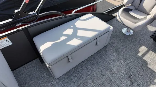 Slide: The Image of 2025 Barletta Aria A22CC boat interior with gray seating and carpeted flooring. - 18