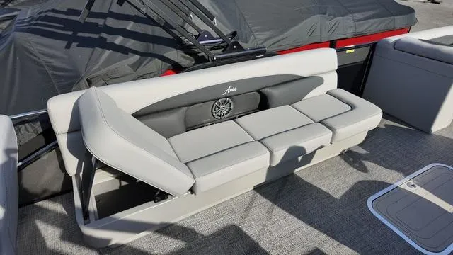 Slide: The Image of 2025 Barletta Aria A22CC boat with gray seating and speaker system. - 26