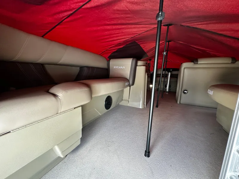Slide: The Image of Interior of 2025 Sylvan Mirage 820 Cruise pontoon boat with red canopy. - 4