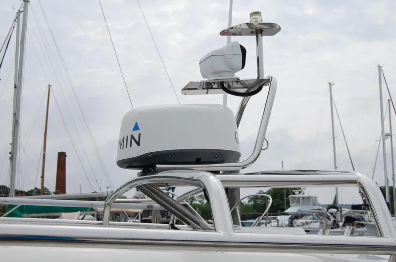 Slide: The Image of Radar equipment on 2019 Axopar 37 SC boat, docked in a marina. - 22