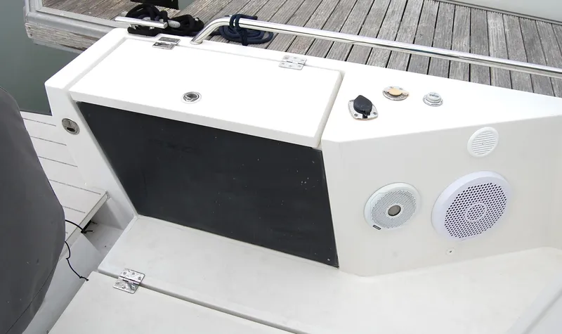 Slide: The Image of 2019 Axopar 37 SC boat deck with speakers and control panel. - 7