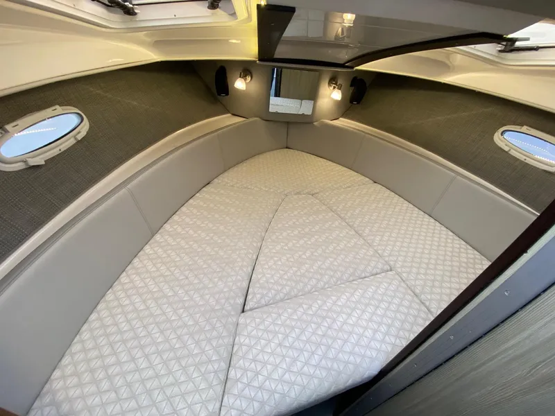 Slide: The Image of 2025 Solara S-250 C cabin interior with cushioned seating and modern lighting. - 17