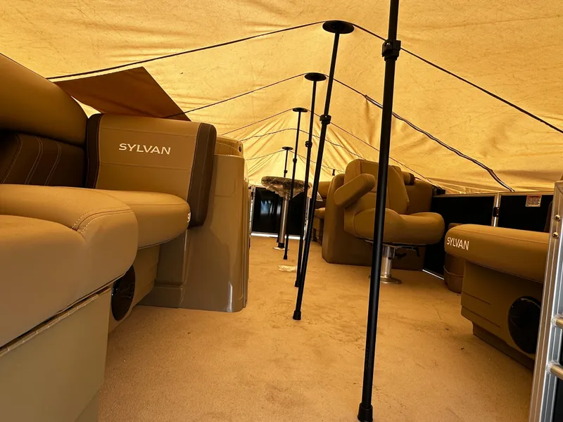 Slide: The Image of Interior view of 2025 Sylvan Mirage 8520 LZ pontoon boat with tan seating. - 5