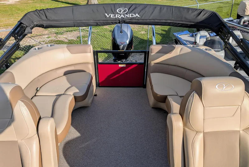 Slide: The Image of 2023 Veranda VR20RC pontoon boat with beige seating and black canopy. - 6
