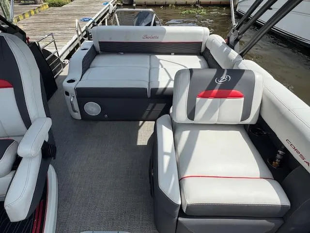 Slide: The Image of 2023 Barletta CORSA 23 UA boat interior with plush seating and modern design. - 10