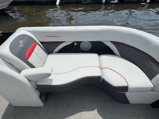 Slide: The Image of 2023 Barletta CORSA 23 UA boat seating with white and gray upholstery, red accents. - 14