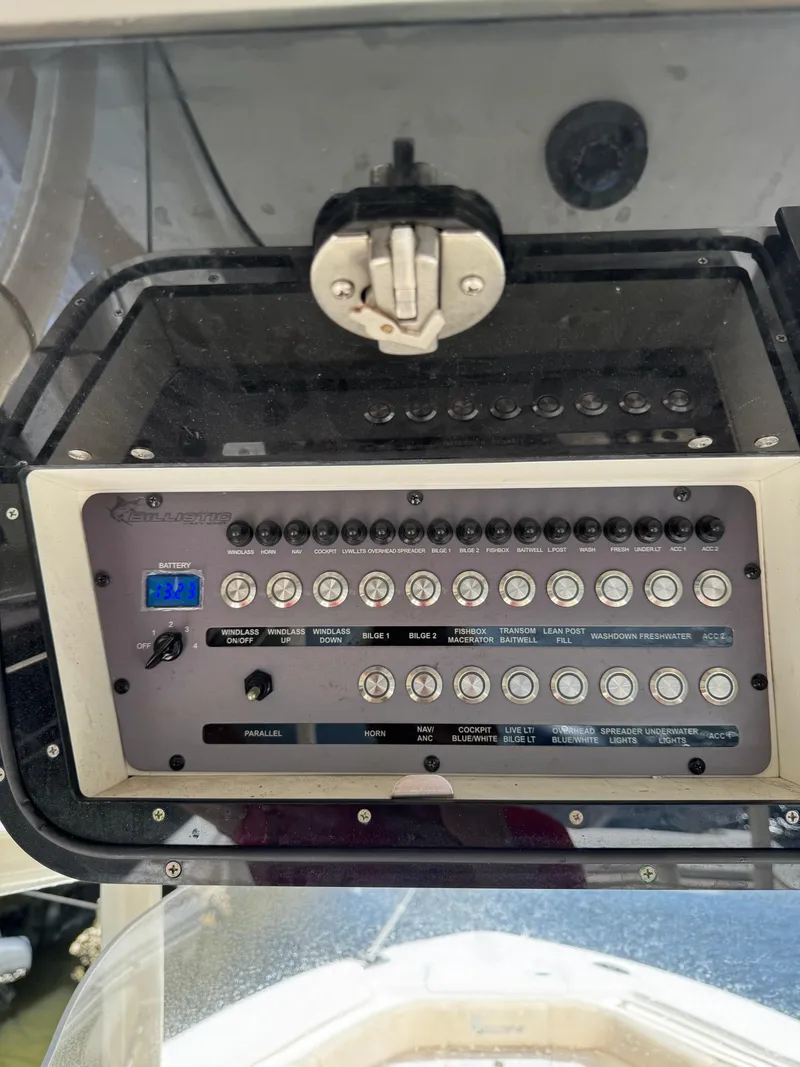 Slide: The Image of Control panel of a 2018 Key West Billistic 281 Center Console boat. - 13