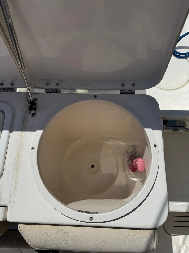 Slide: The Image of 2018 Key West Billistic 281 Center Console livewell with open lid. - 31