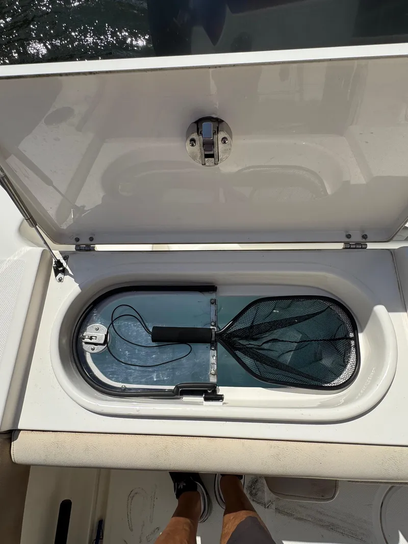 Slide: The Image of 2018 Key West Billistic 281 Center Console livewell with net inside. - 32