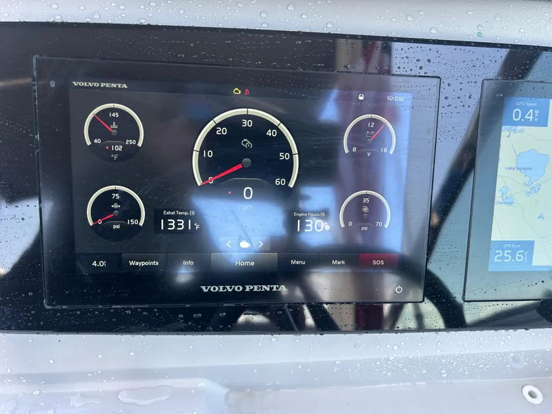 Slide: The Image of Dashboard of a 2022 Regal 28 Express boat with Volvo Penta display. - 17