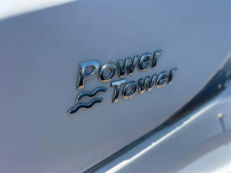Slide: The Image of 2022 Regal 28 Express Power Tower emblem on boat exterior. - 46