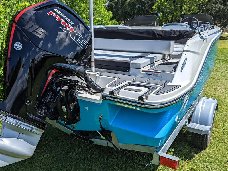 Slide: The Image of 2024 Bayliner Element M19 boat with Mercury engine on a trailer. - 14