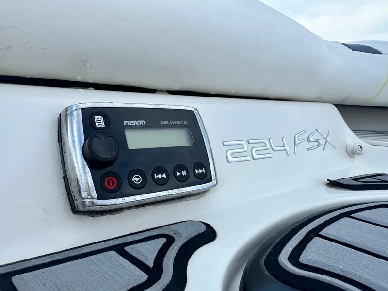 Slide: The Image of Control panel on 2013 Monterey 224FXS boat dashboard. - 10