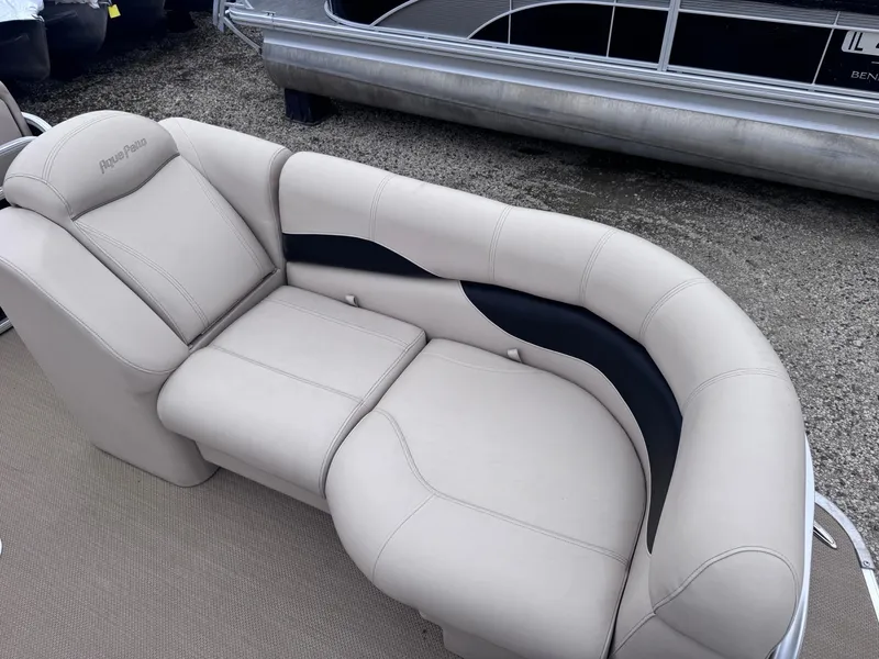 Slide: The Image of Luxurious beige seating on a 2014 Godfrey Aqua Patio AP240EL3 pontoon boat. - 5