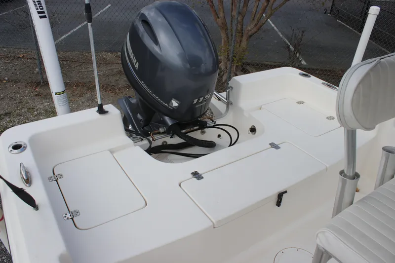 Slide: The Image of 2015 Bulls Bay 2000 boat with outboard motor in a parking area. - 10