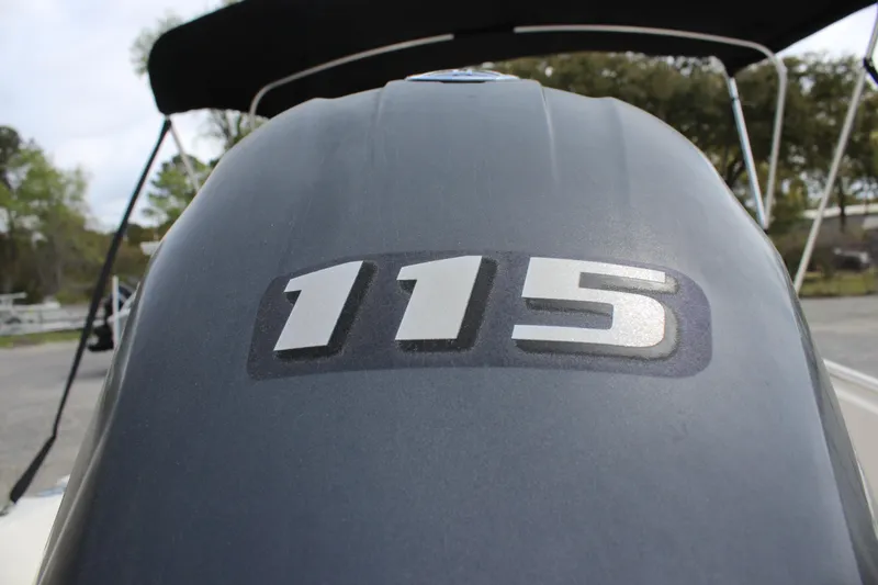 Slide: The Image of Outboard motor with "115" label on a 2015 Bulls Bay 2000 boat. - 16