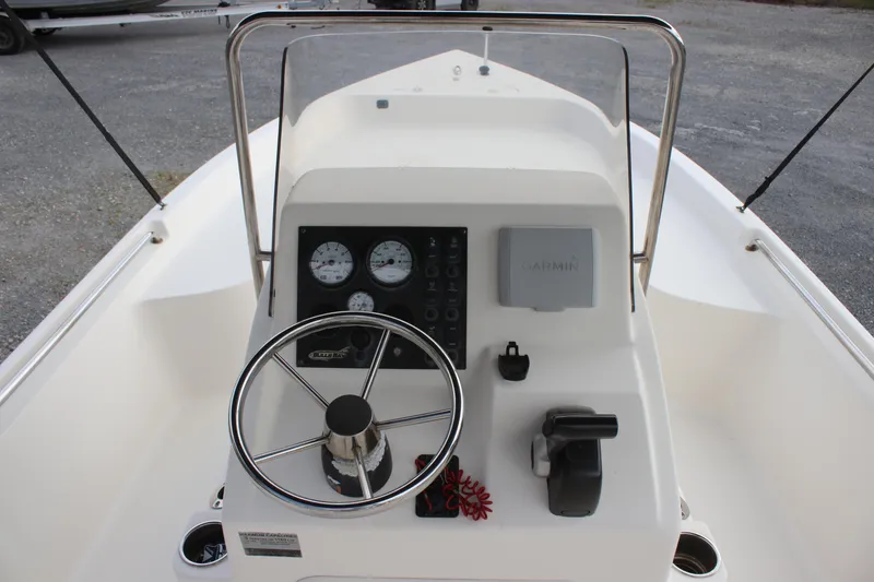 Slide: The Image of 2015 Bulls Bay 2000 boat console with steering wheel and gauges. - 8