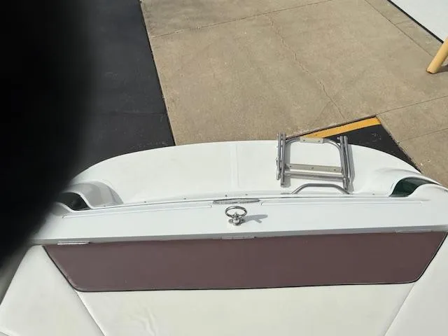 Slide: The Image of 1995 Cobalt 252 boat stern with ladder and white upholstery. - 18